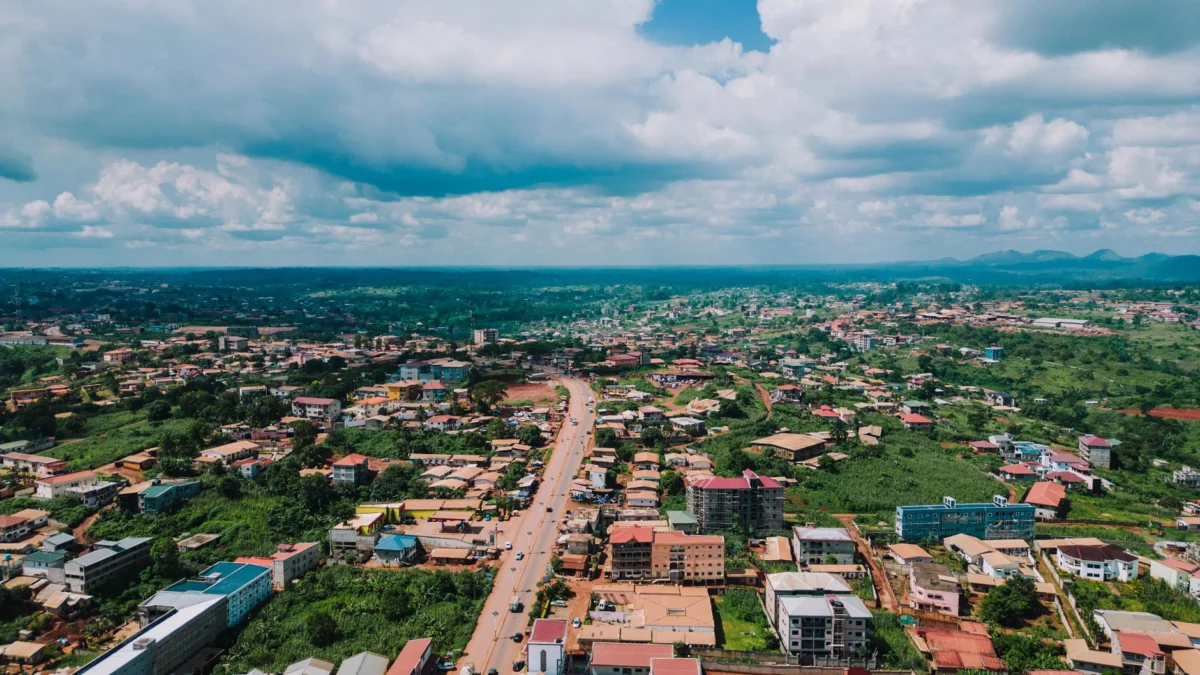 A romantic sunset view over the Yaounde skyline, showcasing the city's allure