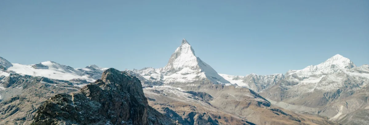 Matterhorn rising above the rooftops of Zermatt at golden hour