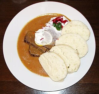 Beef with Cream Sauce and Dumplings