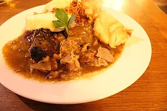 Pork Steak with Cabbage and Dumplings